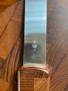 A wonderful small cheese board with spreader designed by Jens Harald Quistgaard for Dansk. Dansk Endwood Staved Teak Cutting Board with Spreader- Cook Street Vintage