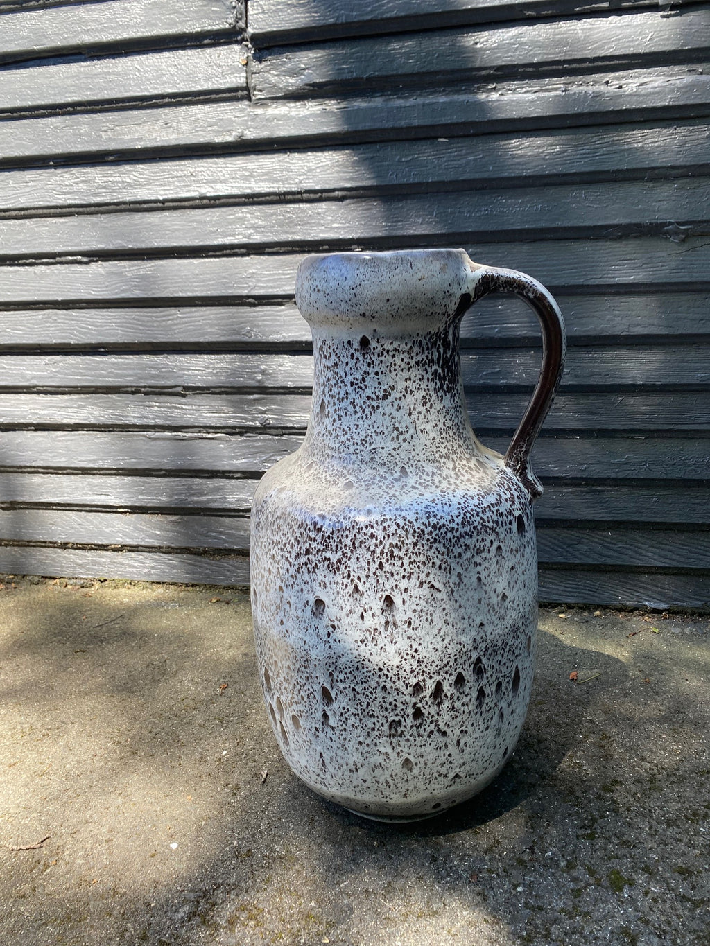 Fabulous West Germany&nbsp; ceramic jug circa 1960s. Textured "fat lava" or foam glaze in white and grey. The interior is glazed in a dark brown. In excellent condition. Stamped W German&nbsp; 0325-50 on base- Cook Street Vintage