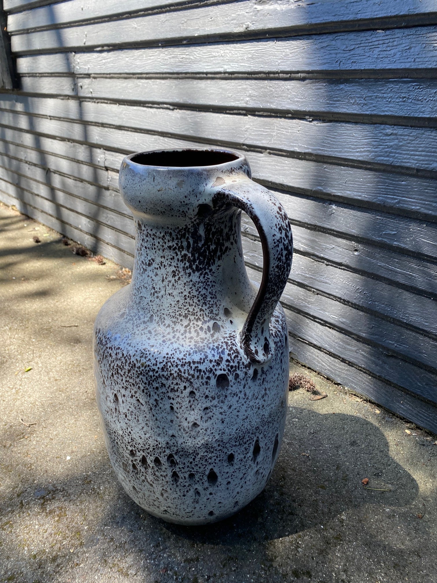 Fabulous West Germany&nbsp; ceramic jug circa 1960s. Textured "fat lava" or foam glaze in white and grey. The interior is glazed in a dark brown. In excellent condition. Stamped W German&nbsp; 0325-50 on base- Cook Street Vintage