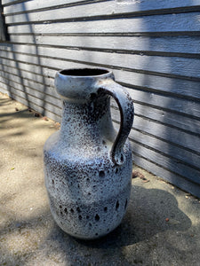 Fabulous West Germany&nbsp; ceramic jug circa 1960s. Textured "fat lava" or foam glaze in white and grey. The interior is glazed in a dark brown. In excellent condition. Stamped W German&nbsp; 0325-50 on base- Cook Street Vintage