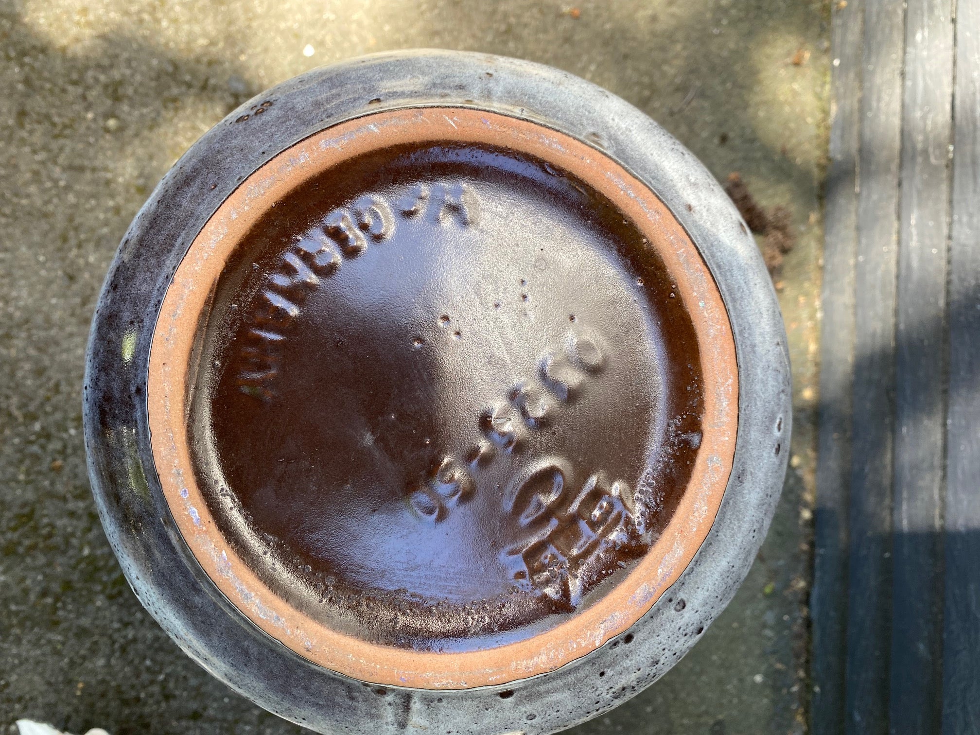 base of Fabulous West Germany&nbsp; ceramic jug circa 1960s. Textured "fat lava" or foam glaze in white and grey. The interior is glazed in a dark brown. In excellent condition. Stamped W German&nbsp; 0325-50 on base- Cook Street Vintage