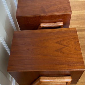 Nice teak side table with filing cabinet size drawer. Gorgeous sculpted wood pulls- Cook Street Vintage.