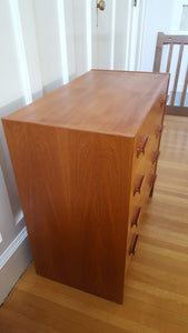 Side view of MCM teak dresser- Cook Street Vintage