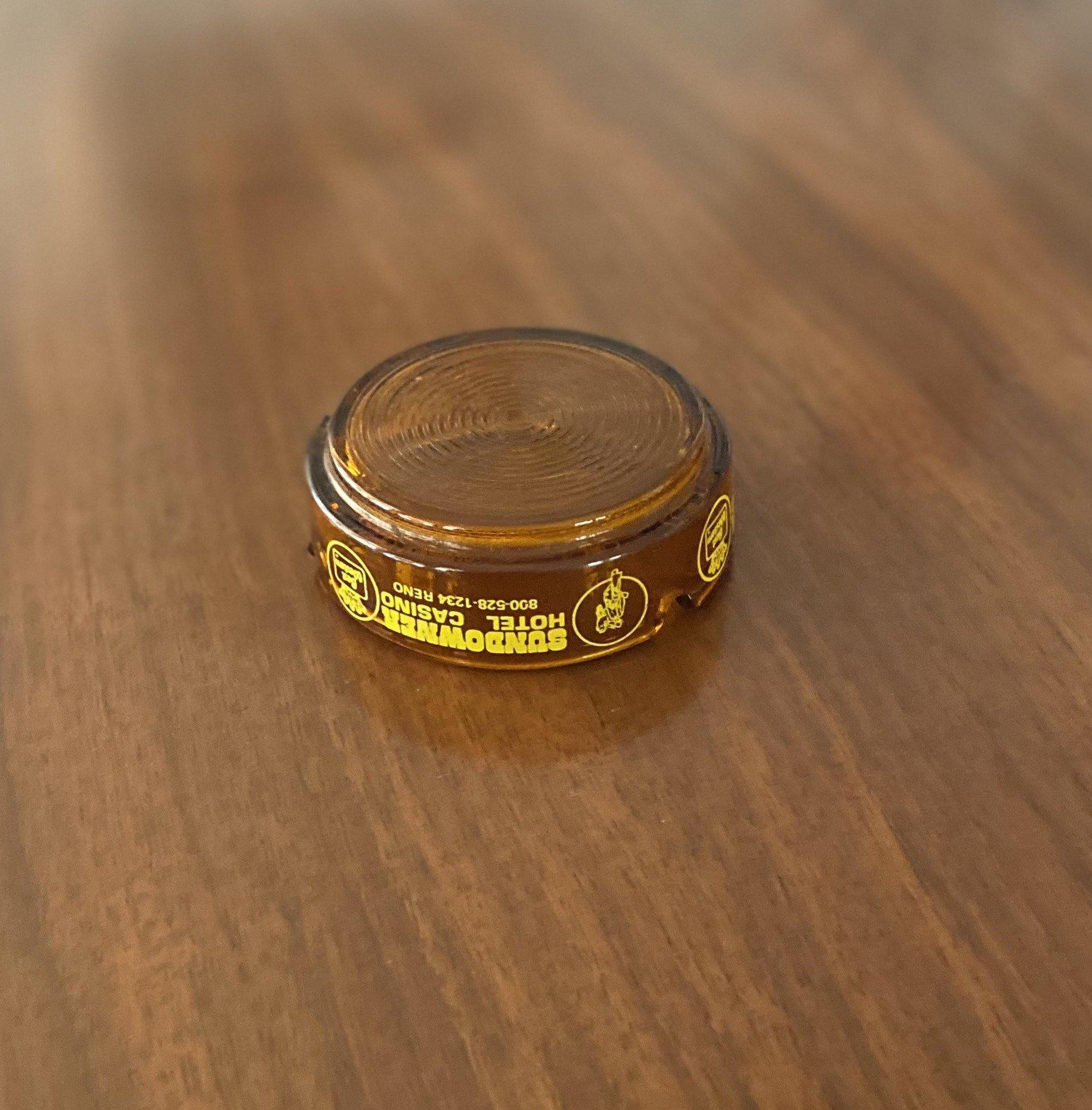 Underside of amber ashtray from Sundowner Hotel and Casino- Cook Street VIntage