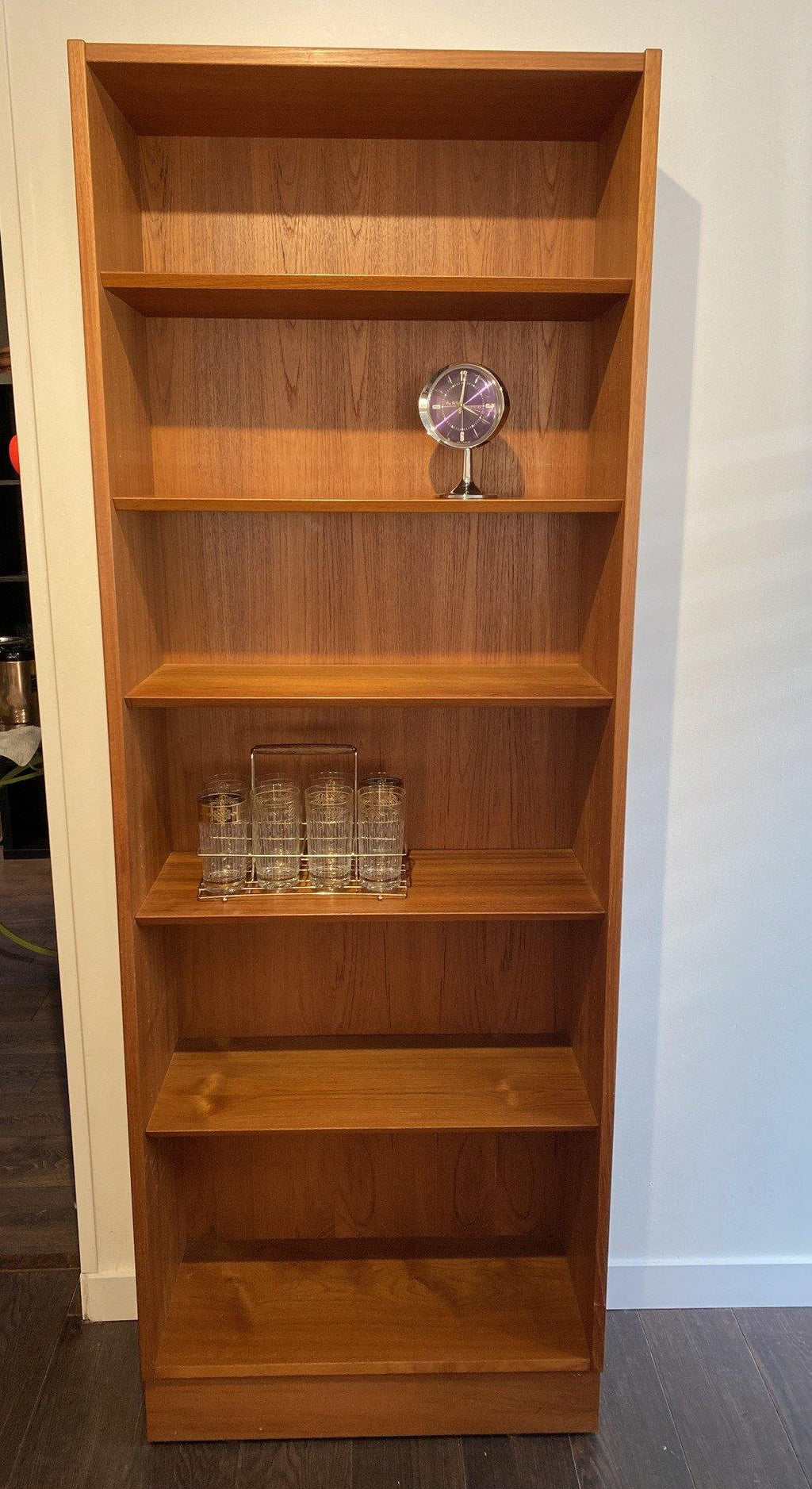 Front view of Hundevad teak Book Case with 6 shelves- Cook Street Vintage
