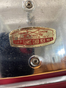 Label on back of chrome and red vinyl folding chair- Cook Street Vintage