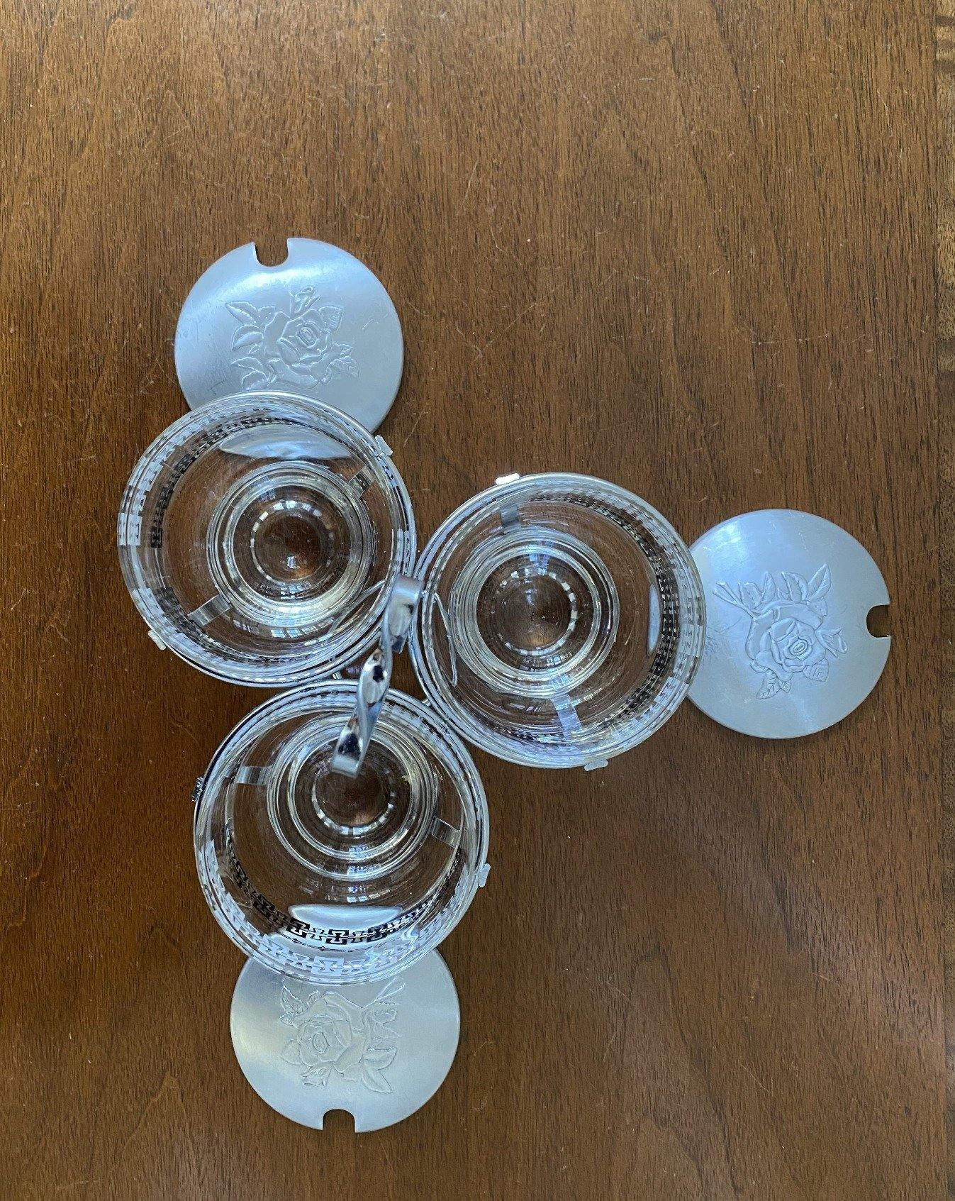 Birds eye view of glass condiment set with lids on table- Cook Street Vintage