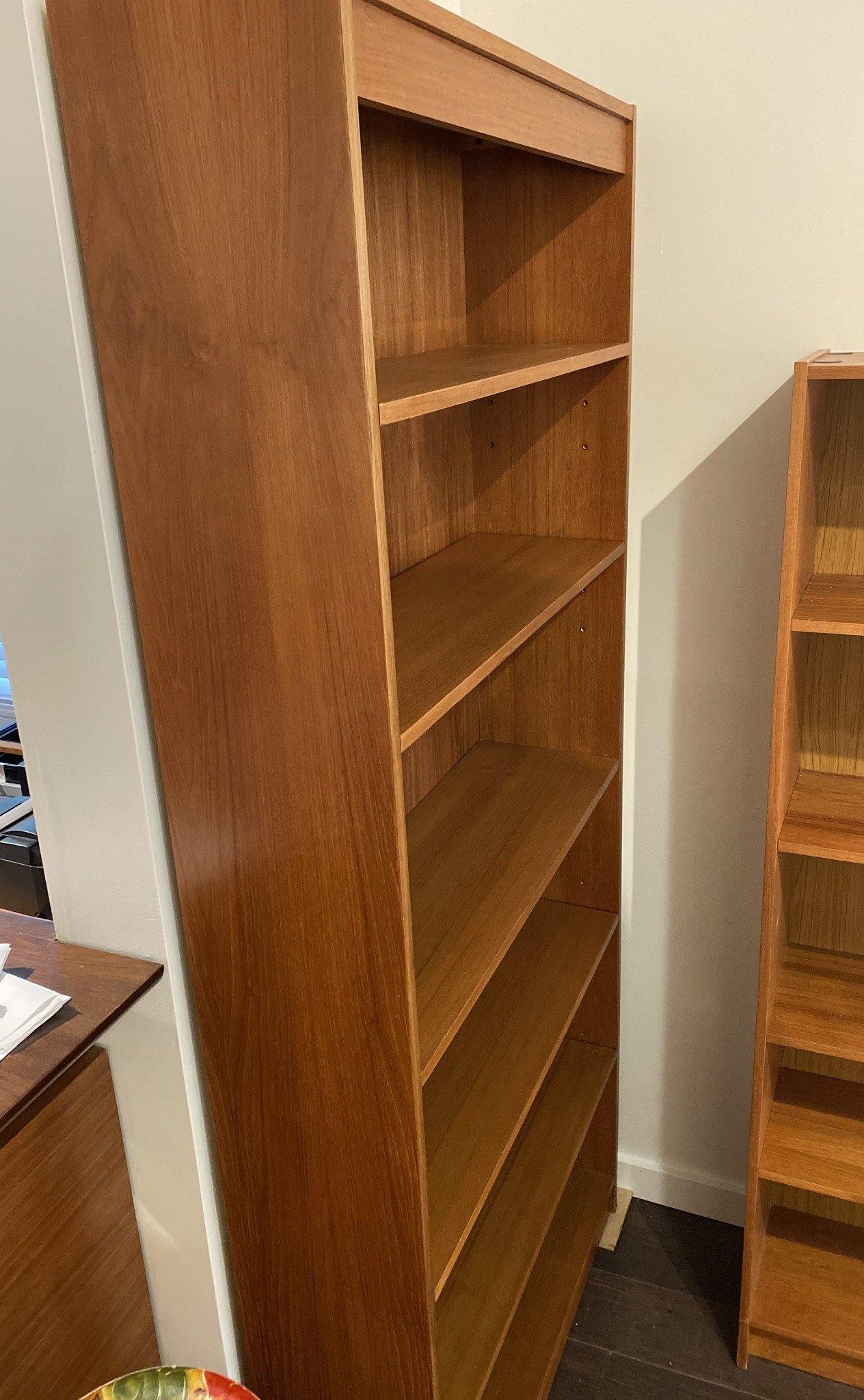 Sideview of teak bookcase with five adjustable shelves- Cook Street Vintage