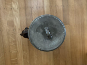 Birds eye view of vintage cookie jar in shape of trash can with bear on side- Cook Street Vintage