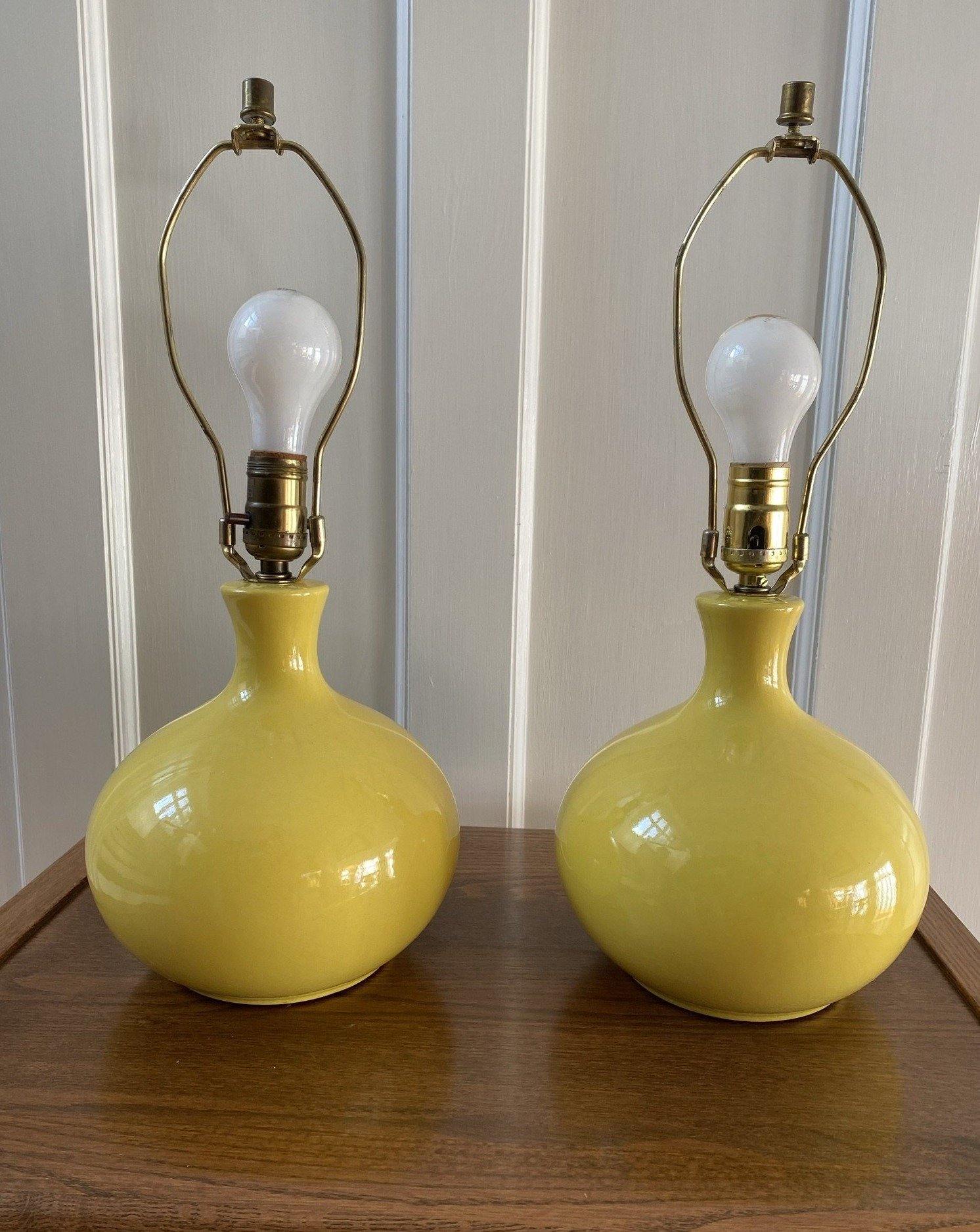 Close up of two vintage yellow ceramic table lamps- Cook Street Vintage