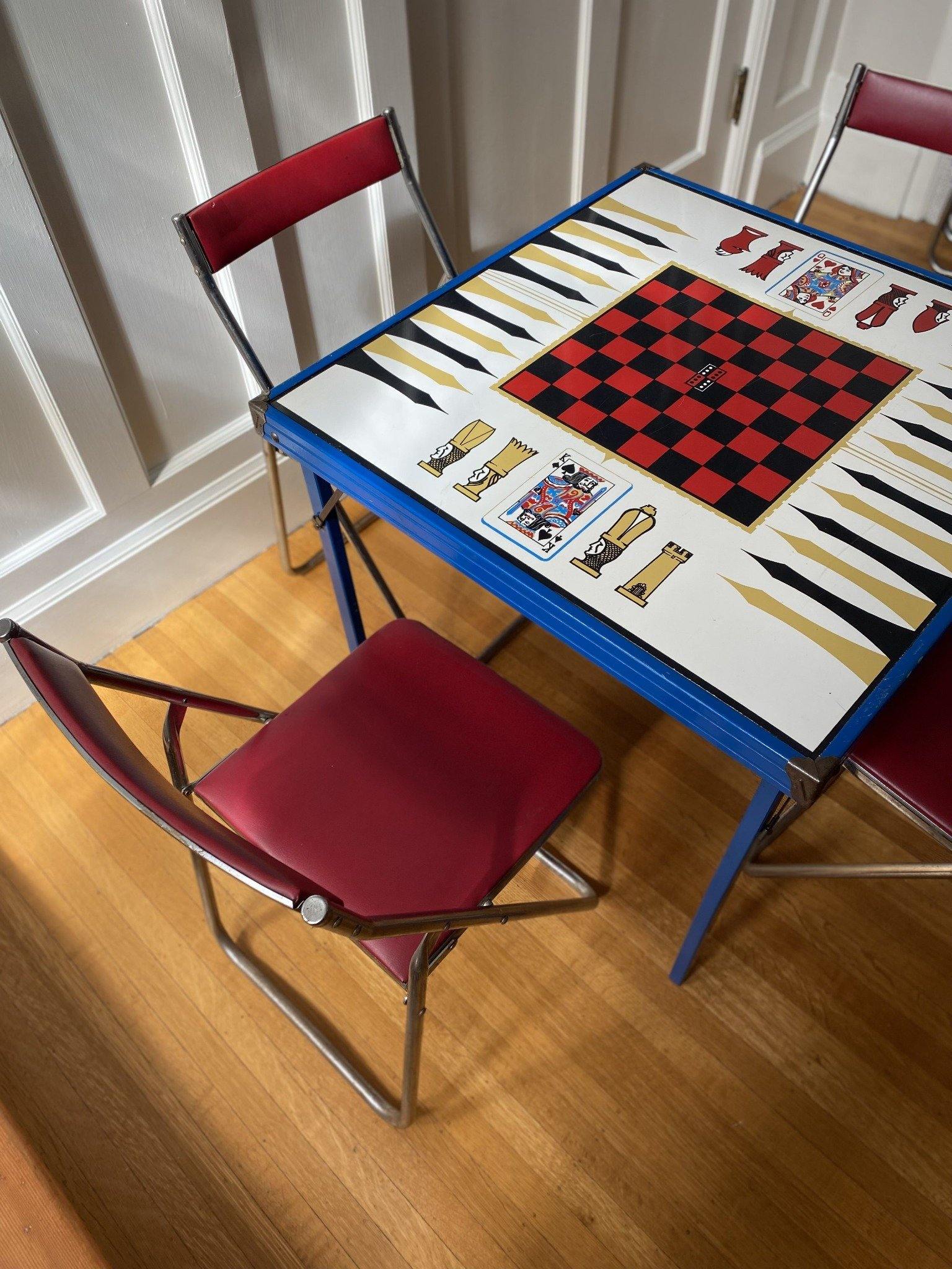 Vintage games table with two chrome and red vinyl folding chairs- Cook Street Vintage