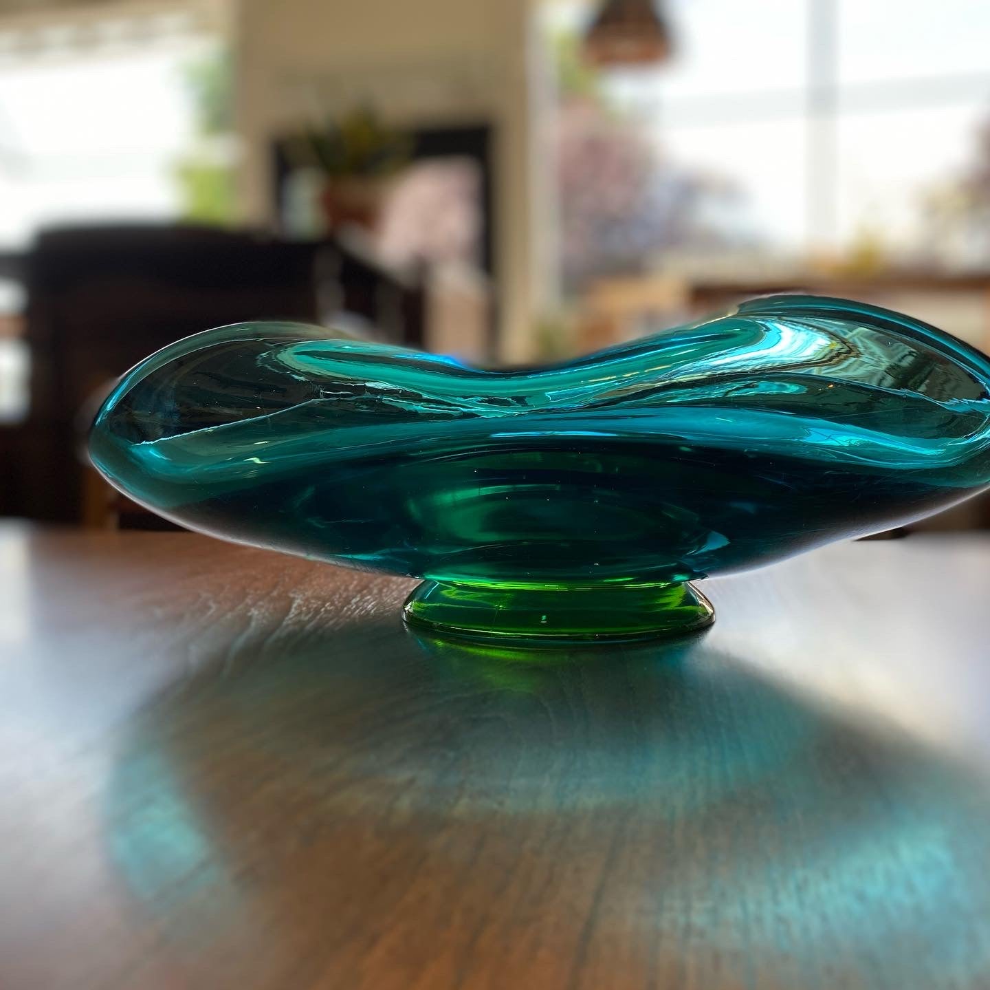 View of aquamarine wave edge art glass bowl base- Cook Street Vintage