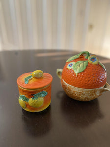 Side view of small orange jam and jely pot with matching tea pot with lemon motifs- Cook Street Vintage
