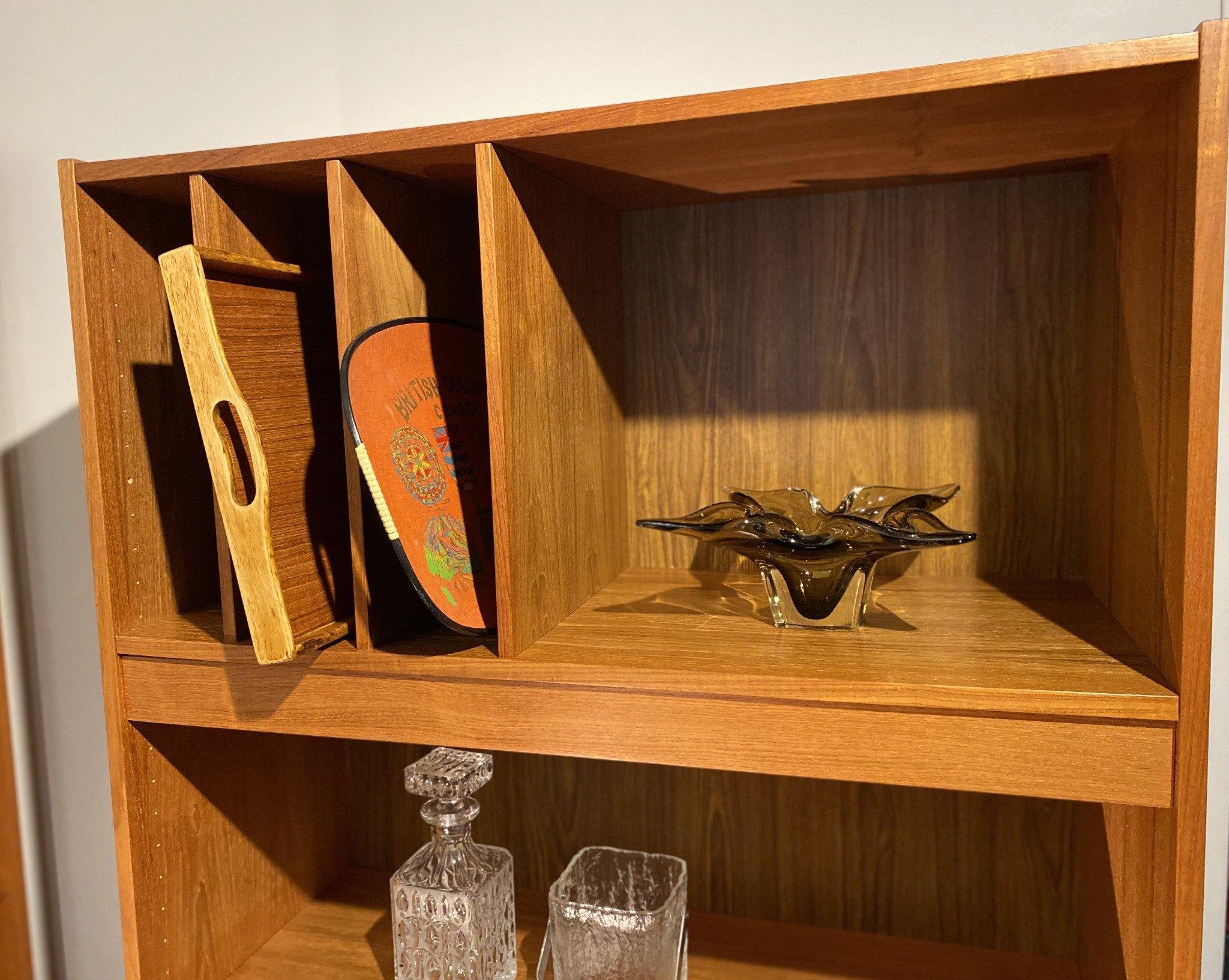 Top half of Danish Teak shelves with art glass and trays- Cook Street Vintage