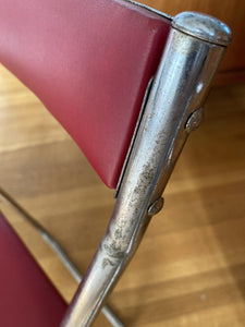 Close up of Chrome and vinyl chair showing rust on chrome- Cook Street Vintage