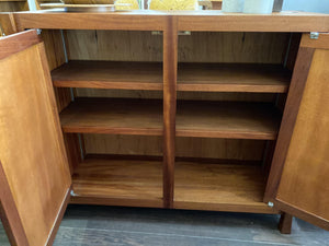 Interior view of two adjustable shelves in teak bar storage cabinet- Cook Street Vintage
