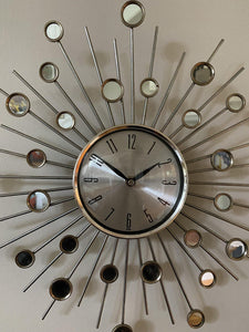 Close up of wall clock with mirrors and pointed detail- Cook Street Vintage