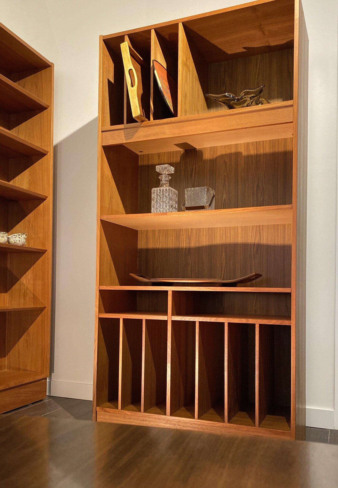 Beautiful Danish teak  shelves with vertical shelves on bottom and crystal decanters on middle - Cook Street Vintage