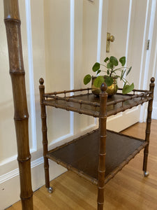 Close up of faux bamboo floor lamp withbamboo walnut bar cart in background- Cook Street Vintage