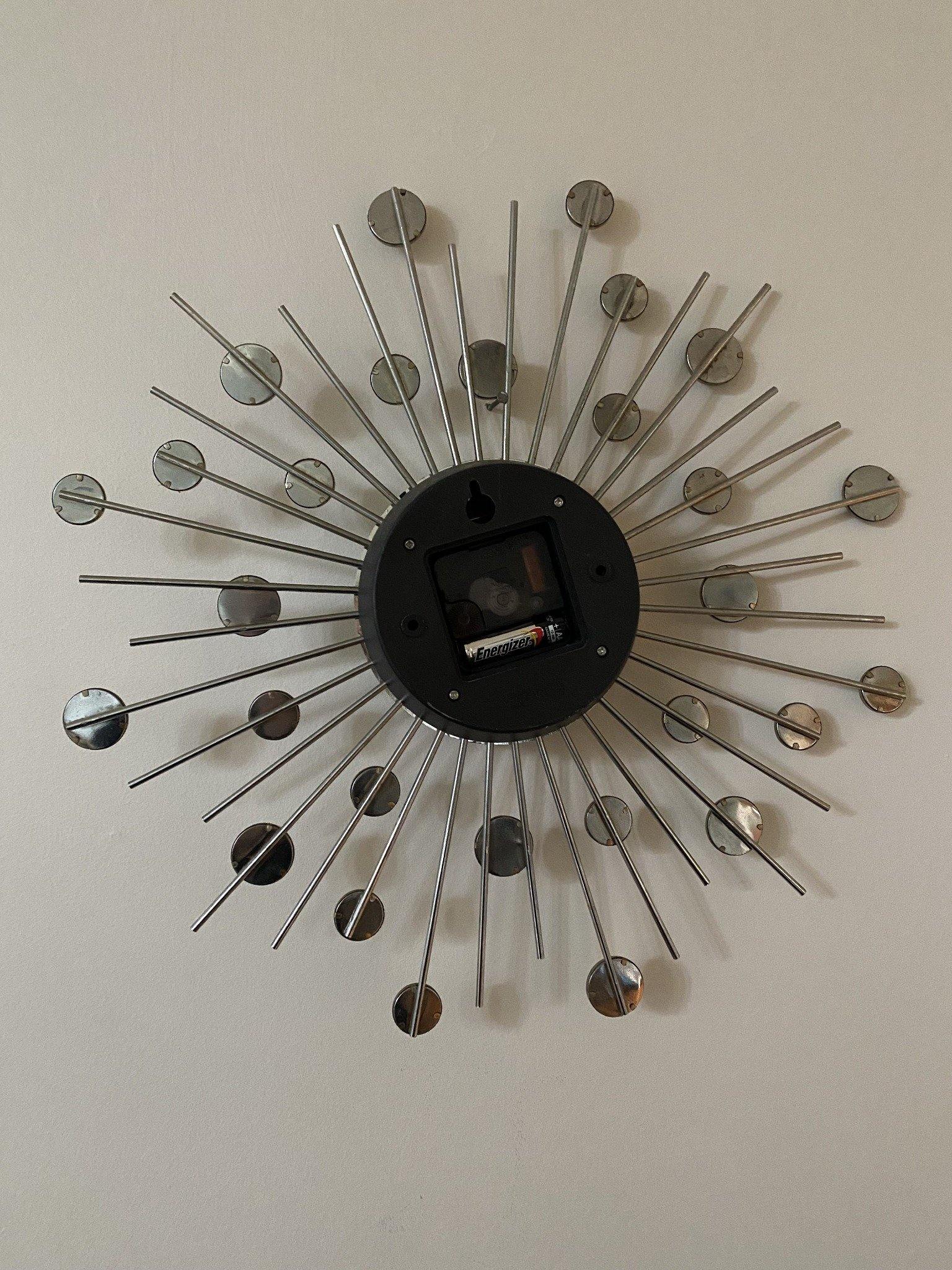 Reverse side of mirrored wall clock- Cook Street Vintage
