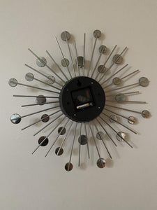 Reverse side of mirrored wall clock- Cook Street Vintage