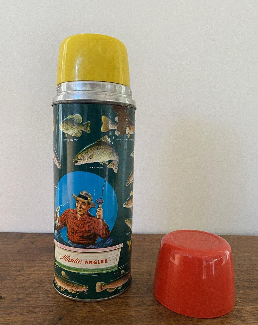 Aladdin Angler Thermos Front view with red cup on table- Cook Street Vintage