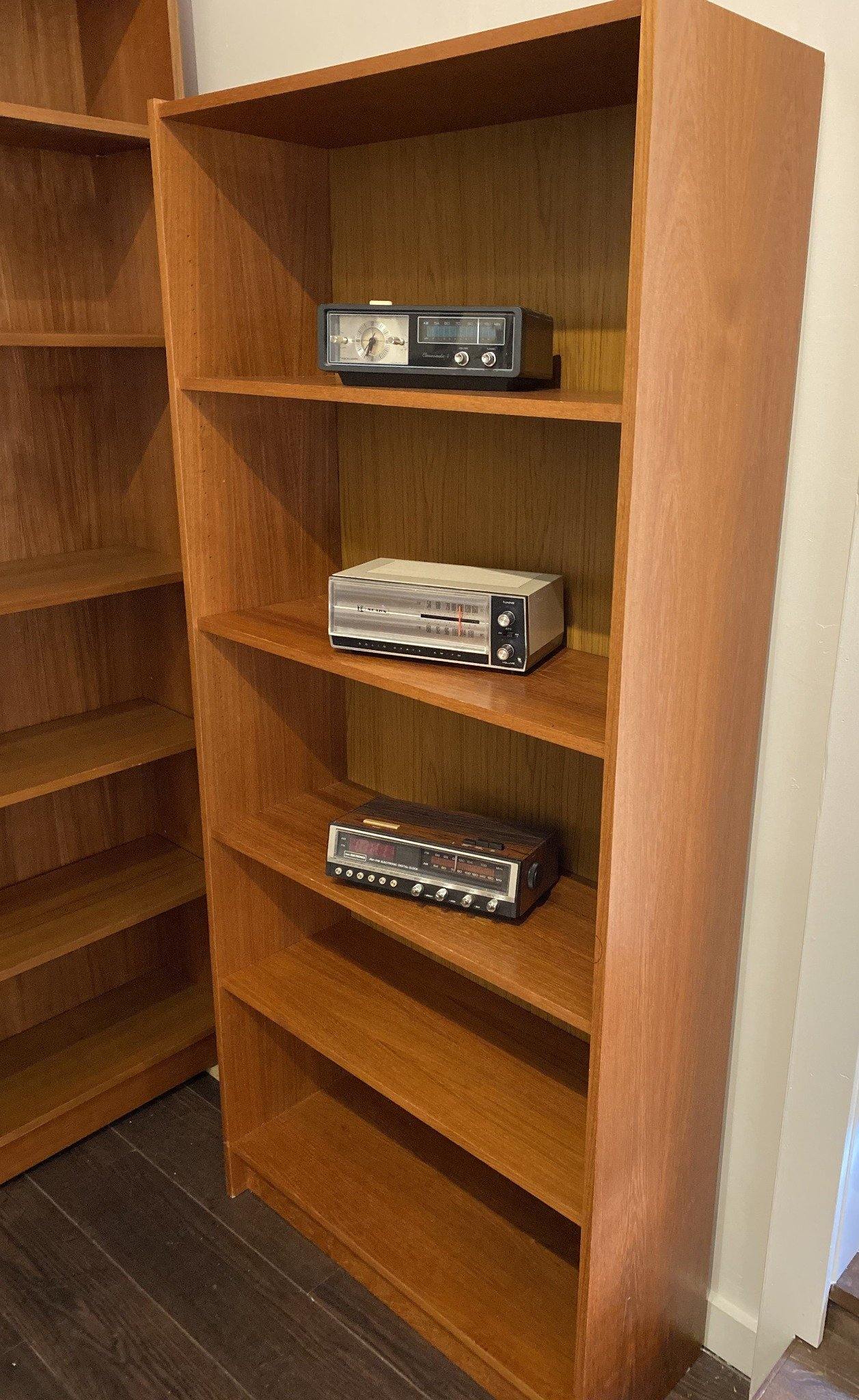 Side view of teak shelves with vintage radios- Cook Street Vintage