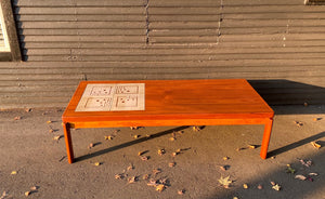 Stunning Danish mid-century modern teak coffee table with beautiful dovetail details and cream ceramic tile inlays. Attributed to H.W Klein- Cook Street Vintage