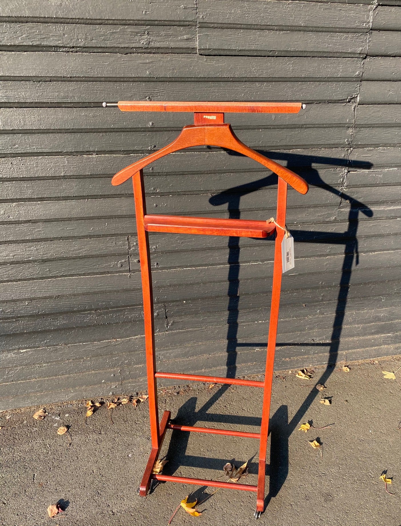 Get organized with this gorgeous vintage teak valet. Perfect in a bedroom or at the front door. In fabulous vintage condition with original casters and change catcher. Made in Italy by Reguitti -Cook Street Vintage   