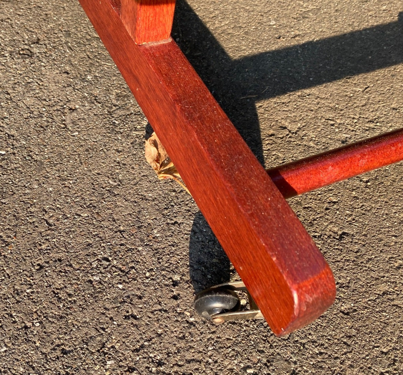 Get organized with this gorgeous vintage teak valet. Perfect in a bedroom or at the front door. In fabulous vintage condition with original casters and change catcher. Made in Italy by Reguitti -Cook Street Vintage   
