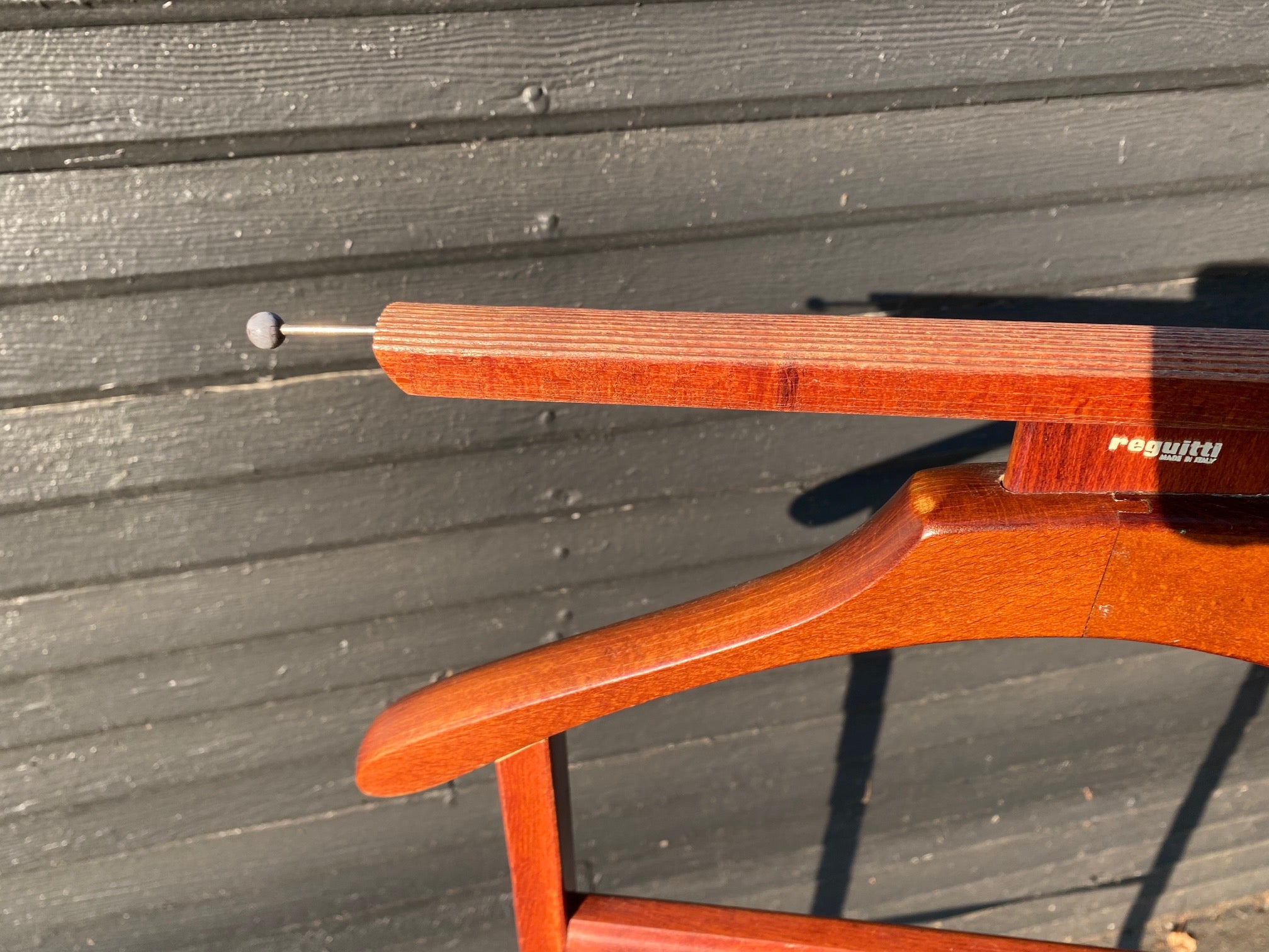 Get organized with this gorgeous vintage teak valet. Perfect in a bedroom or at the front door. In fabulous vintage condition with original casters and change catcher. Made in Italy by Reguitti -Cook Street Vintage   