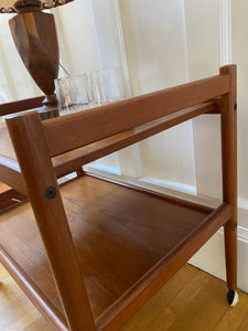 Lovely mid-century teak bar cart with original casters. Made in Denmark-Cook Street Vintage