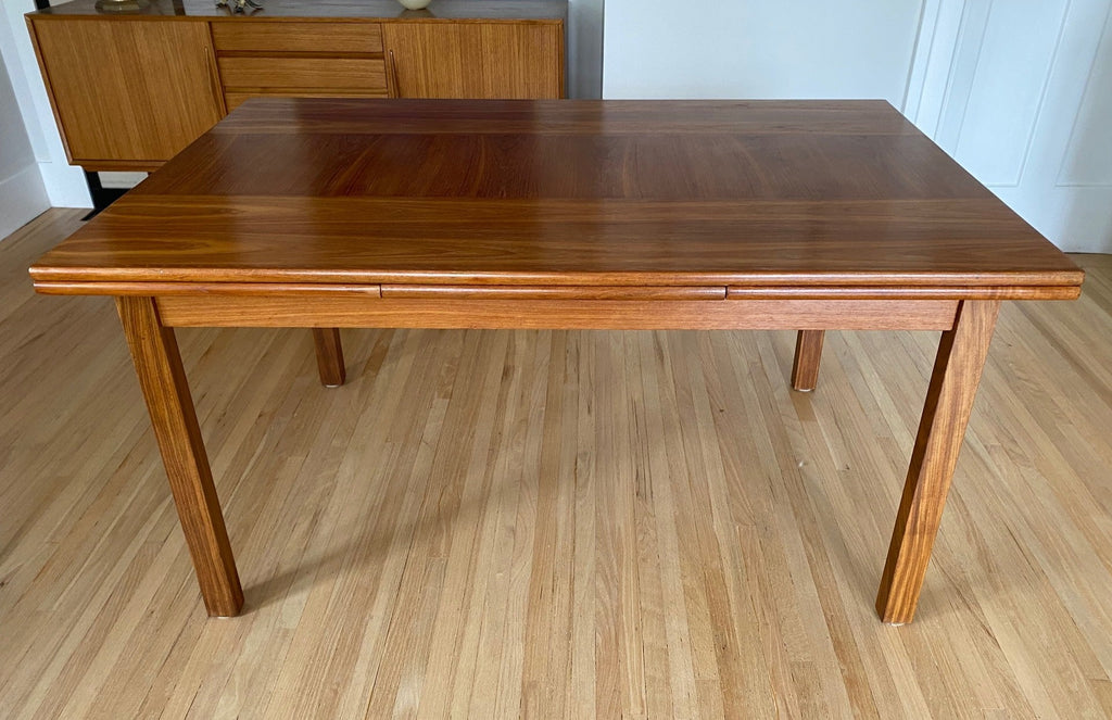 Beautiful Danish teak draw leaf/pocket leaf teak dining table- Cook Street Vintage