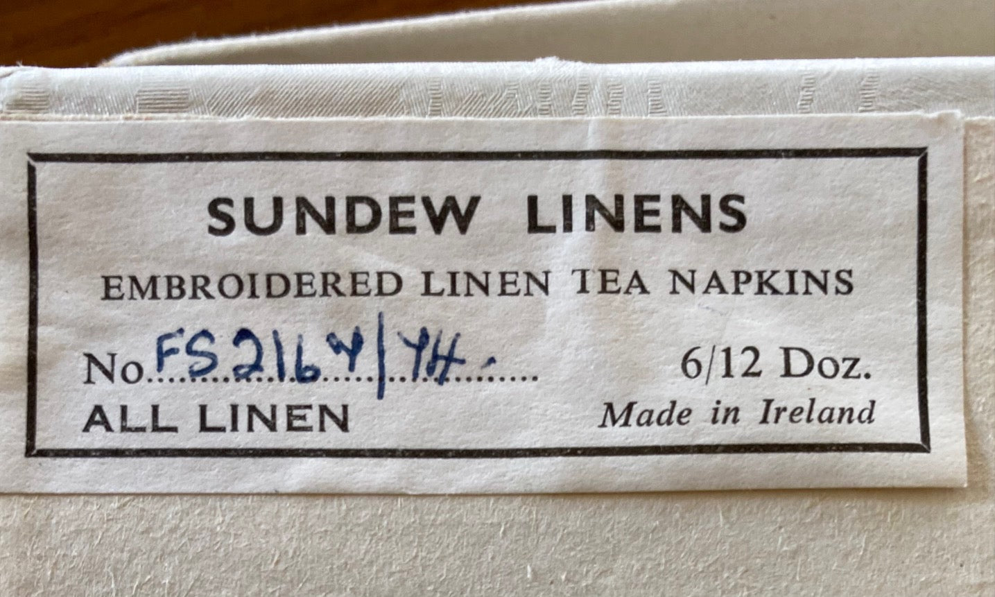 label on back of box for Set of Ceremonial Army Uniforms Irish Linen Napkins- Cook Street Vintage