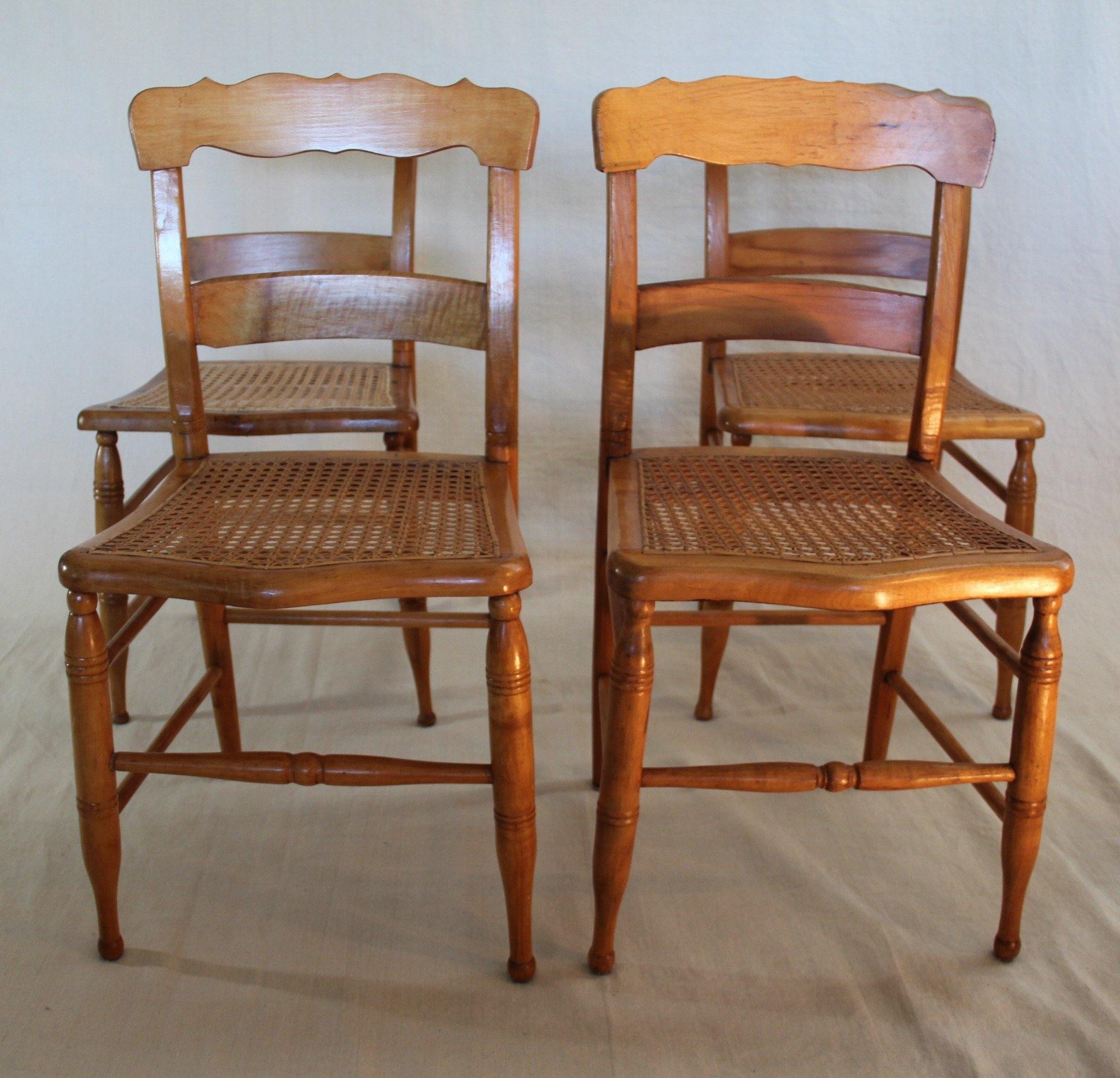 Front View of four Pine chairs with cane seats-Cook Street Vintage