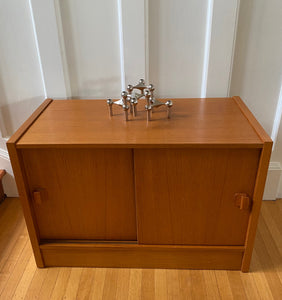 Stunning MCM Stoff Nagel Modular Chrome Candle Holder on a teak cabinet with sliding doors- Cook Street Vintage