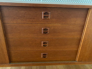 Gorgeous Scandinavian design teak credenza. Four drawers with square insert pulls and two sliding cabinets with shelves-Cook Street Vintage
