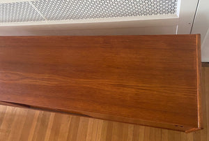 Top of Gorgeous Scandinavian design teak credenza. Four drawers with square insert pulls and two sliding cabinets with shelves- Cook Street Vintage