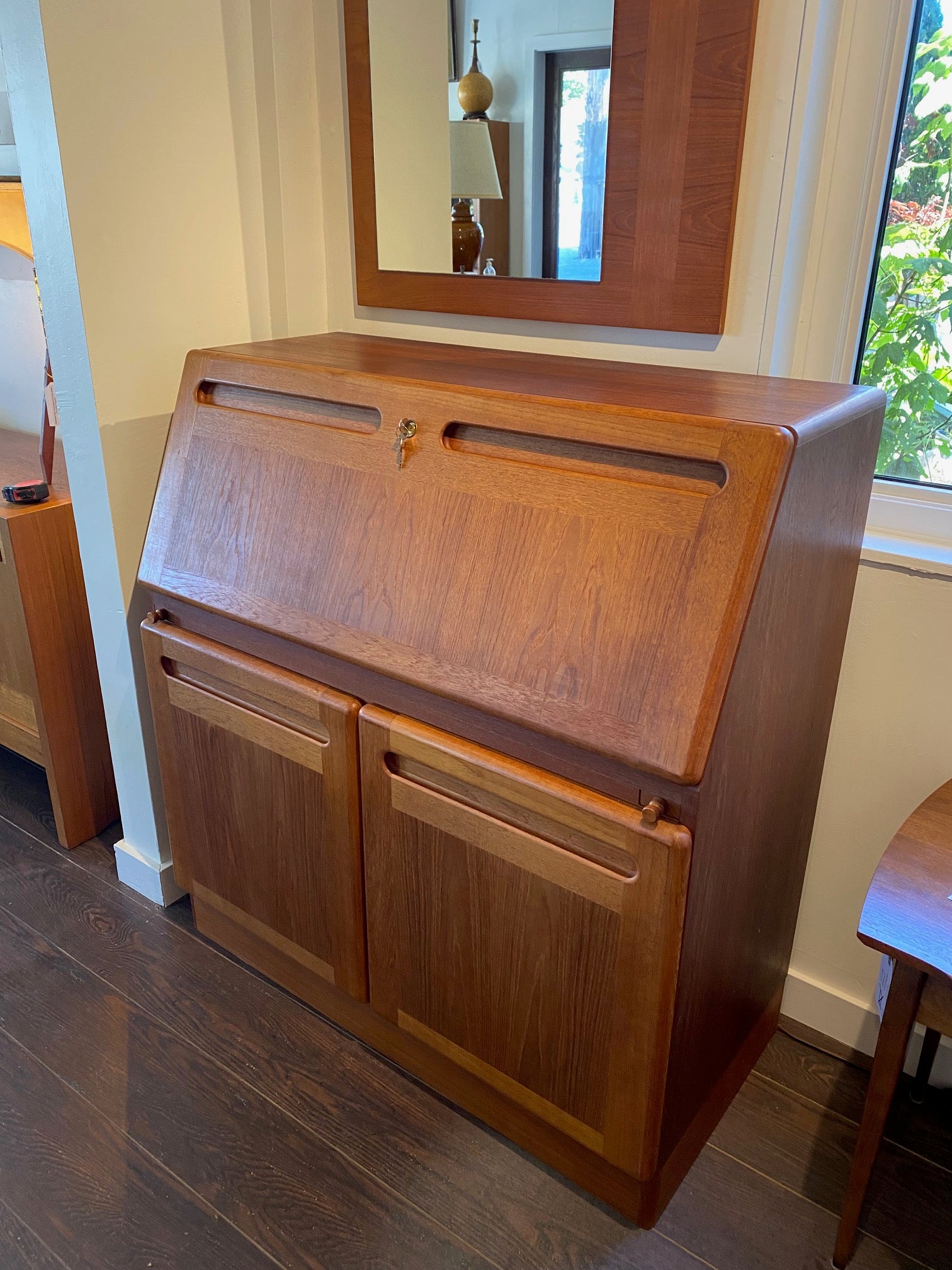 Danish MCM Teak Desk closed with carved lower cabinet handles- Cook Street Vintage