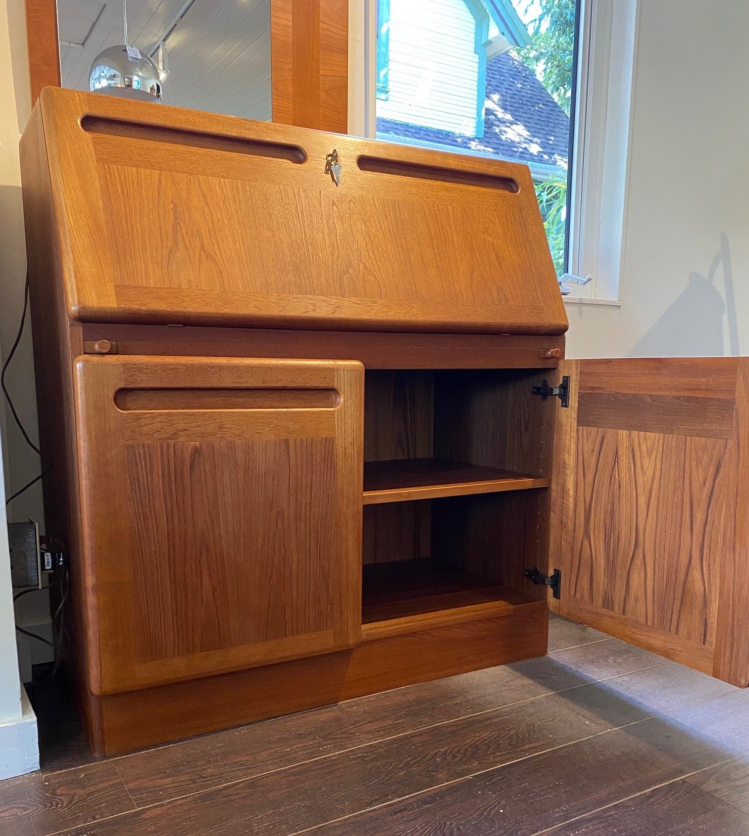 Danish Midcentury teak secretary with one lower cabinet door open revealing adjustable shelf- Cook Street Vintage