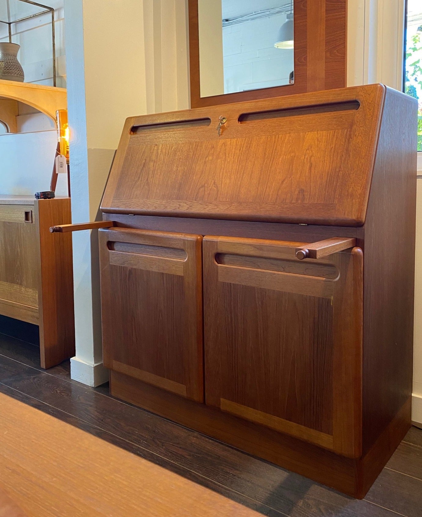 Front view Danish MCM Teak desk with teak arms extended- Cook Street Vintage