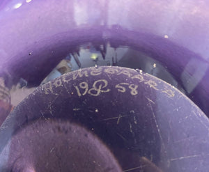 Etched bottom of MCM Per Lutken Holmegaard smoke dish on purple background- Cook Street Vintage