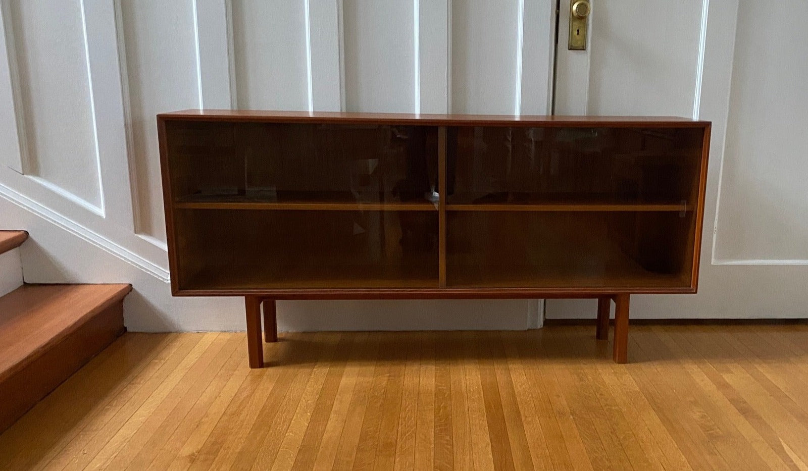 Nice teak low horizontal teak cabinet with sliding glass doors- Cook Street Vintage
