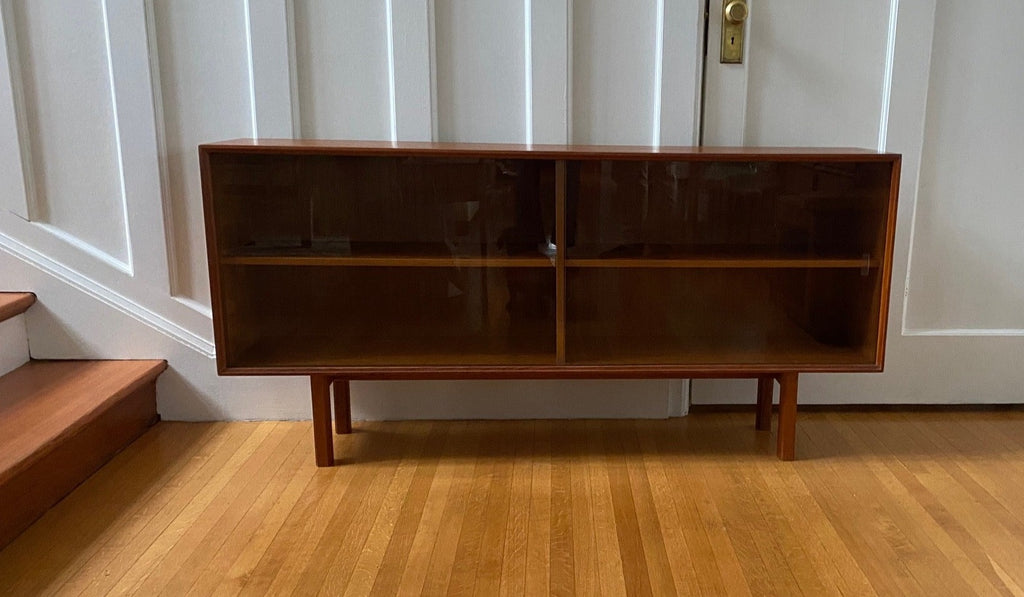 Nice teak low horizontal teak cabinet with sliding glass doors- Cook Street Vintage