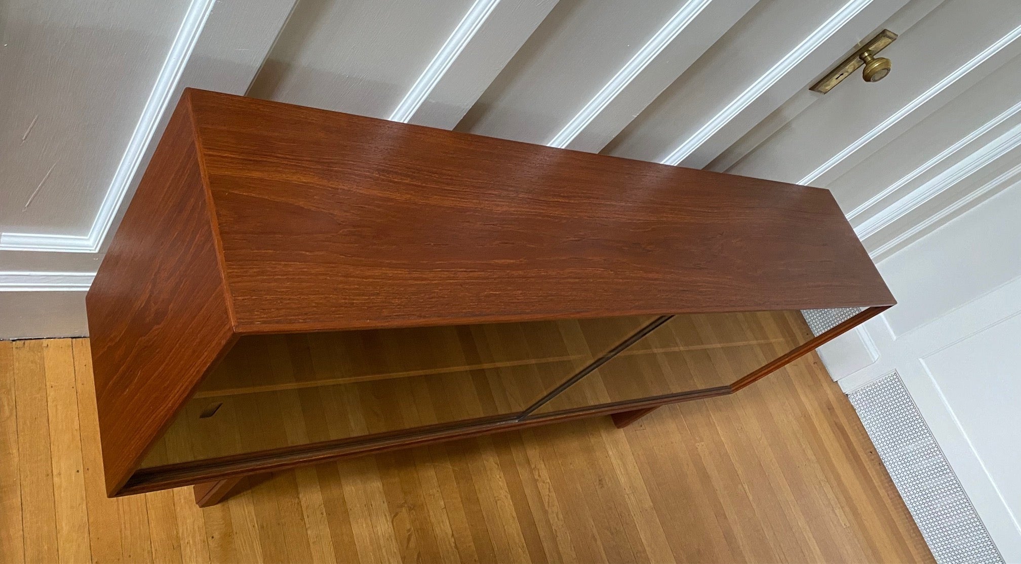 Nice teak low horizontal teak cabinet with sliding glass doors