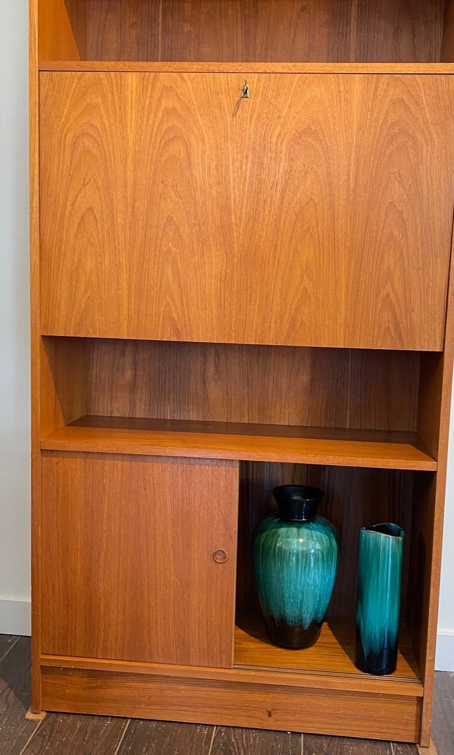 Bottom cabinet with Blue Mountain Pottery vases in Danish Teak Shelves - Cook Street Vintage