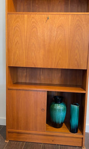 Bottom cabinet with Blue Mountain Pottery vases in Danish Teak Shelves - Cook Street Vintage