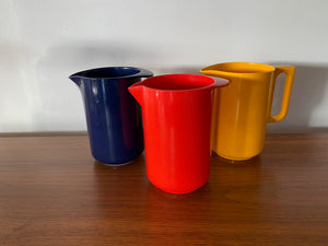 Red, blue and yellow 1970s melamine jugs- Cook Street Vintage