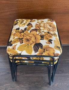 Top view of vintage stacking stools with yellow floral fabric- Cook Street Vintage