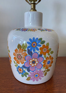 Close up of orange, pink and blue flowers on mid century ceramic bedroom lamp- Cook Street Vintage
